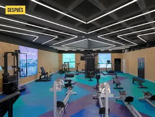 Sala de gimnasio terminada con piso de colores e iluminación hexagonal
